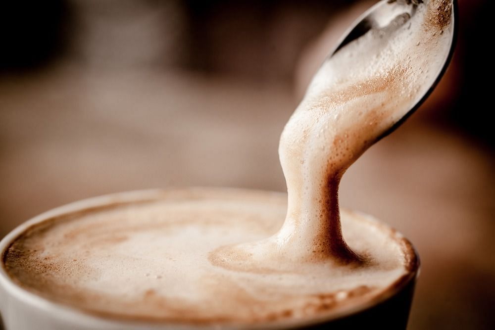 Coconut oil in coffee (Image via Getty Images)